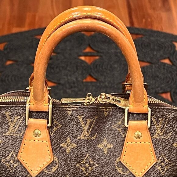 Louis Vuitton Alma Monogram Bag - Picture 11 of 14